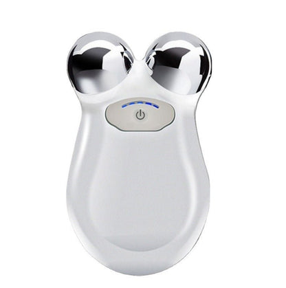 Microcurrent Facial Toning Massager - Tiny Tim SkincareMicrocurrent Facial Toning MassagerFacial ToningDC - BeNatTiny Tim SkincareDC-2075013Microcurrent Facial Toning Massager